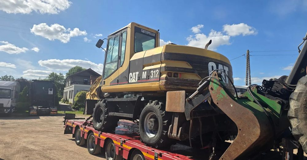 Caterpillar M312 - Mobilbagger: das Bild 4 Caterpillar M312 - Mobilbagger: das Bild 4
