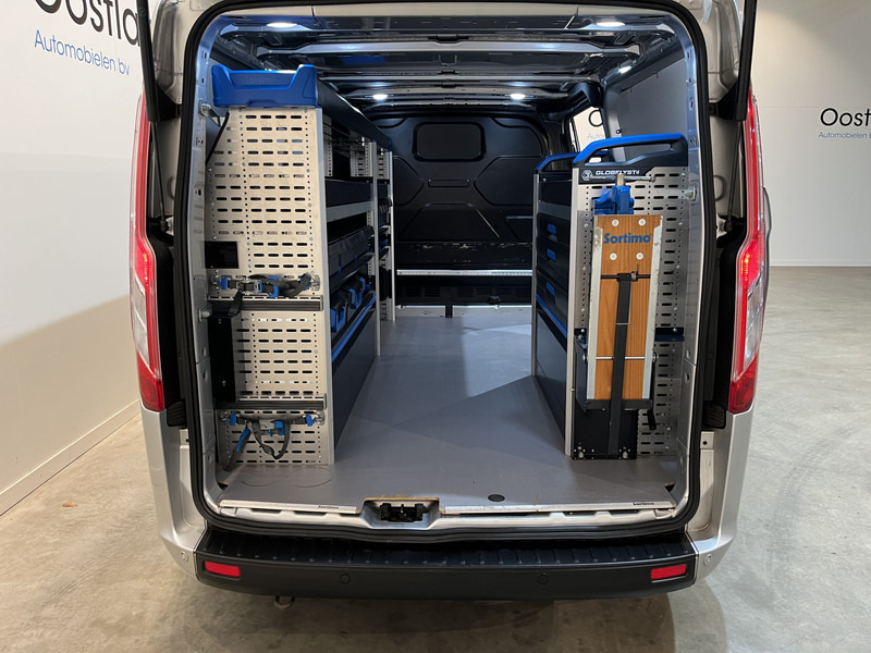 Ford Transit Custom 300 2.0 TDCI L2H1 Trend 130 PK Servicebus / Sortimo Inrichting / Euro 6 / Airco / Cruise Control / Klep / PDC / 3-Zits - Kleintransporter: das Bild 4 Ford Transit Custom 300 2.0 TDCI L2H1 Trend 130 PK Servicebus / Sortimo Inrichting / Euro 6 / Airco / Cruise Control / Klep / PDC / 3-Zits - Kleintransporter: das Bild 4