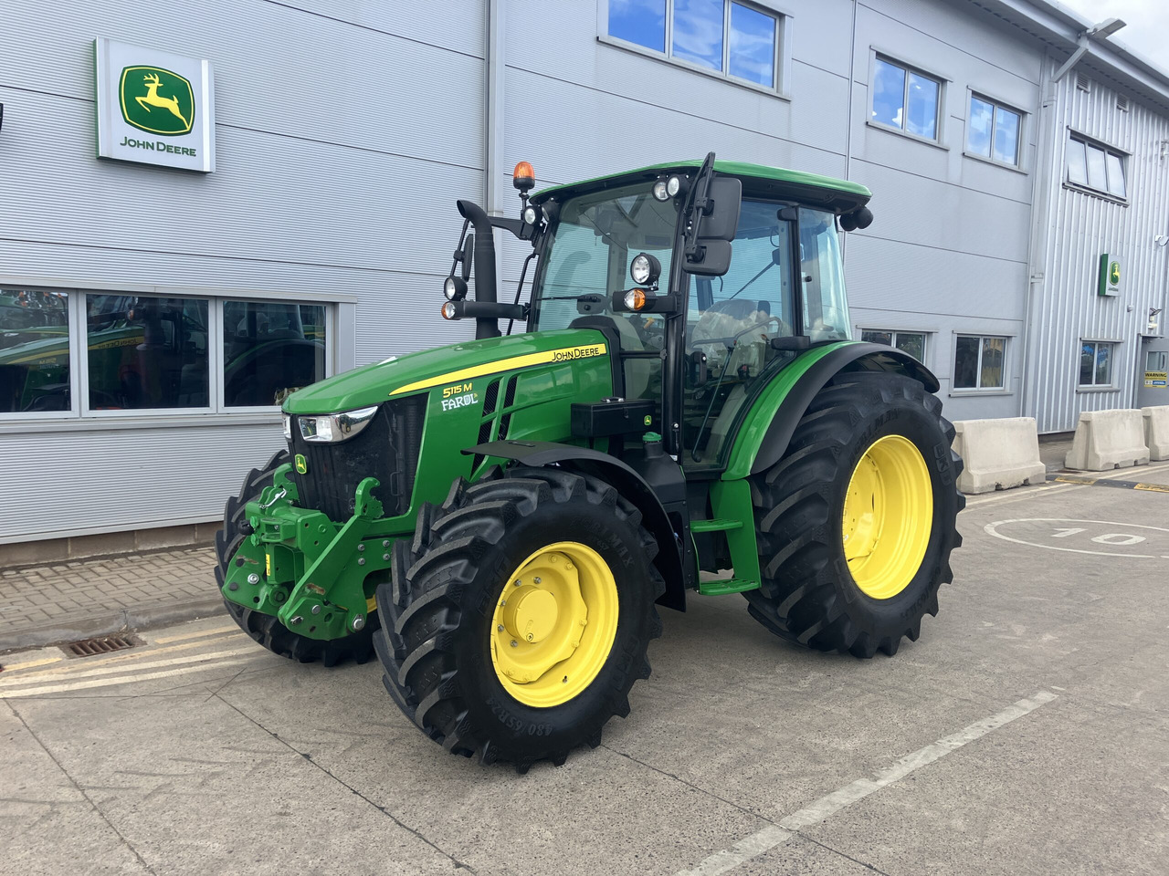 John Deere 5115M - Traktor: das Bild 1 John Deere 5115M - Traktor: das Bild 1