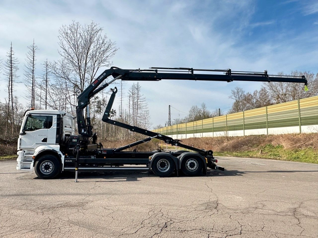 MAN TGS 26.470 6x2 Abrollkipper + Kran Hiab 228-4 - Abrollkipper, Autokran: das Bild 2 MAN TGS 26.470 6x2 Abrollkipper + Kran Hiab 228-4 - Abrollkipper, Autokran: das Bild 2