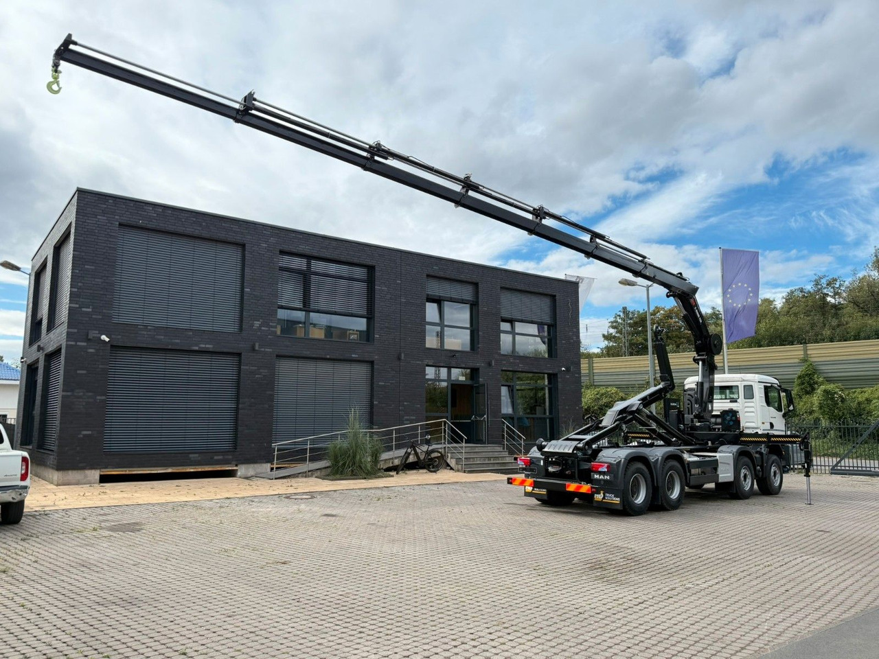 MAN TGS 35.480 8x4 Abrollkipper + Kran HIAB 228-6 - Abrollkipper, Autokran: das Bild 4 MAN TGS 35.480 8x4 Abrollkipper + Kran HIAB 228-6 - Abrollkipper, Autokran: das Bild 4