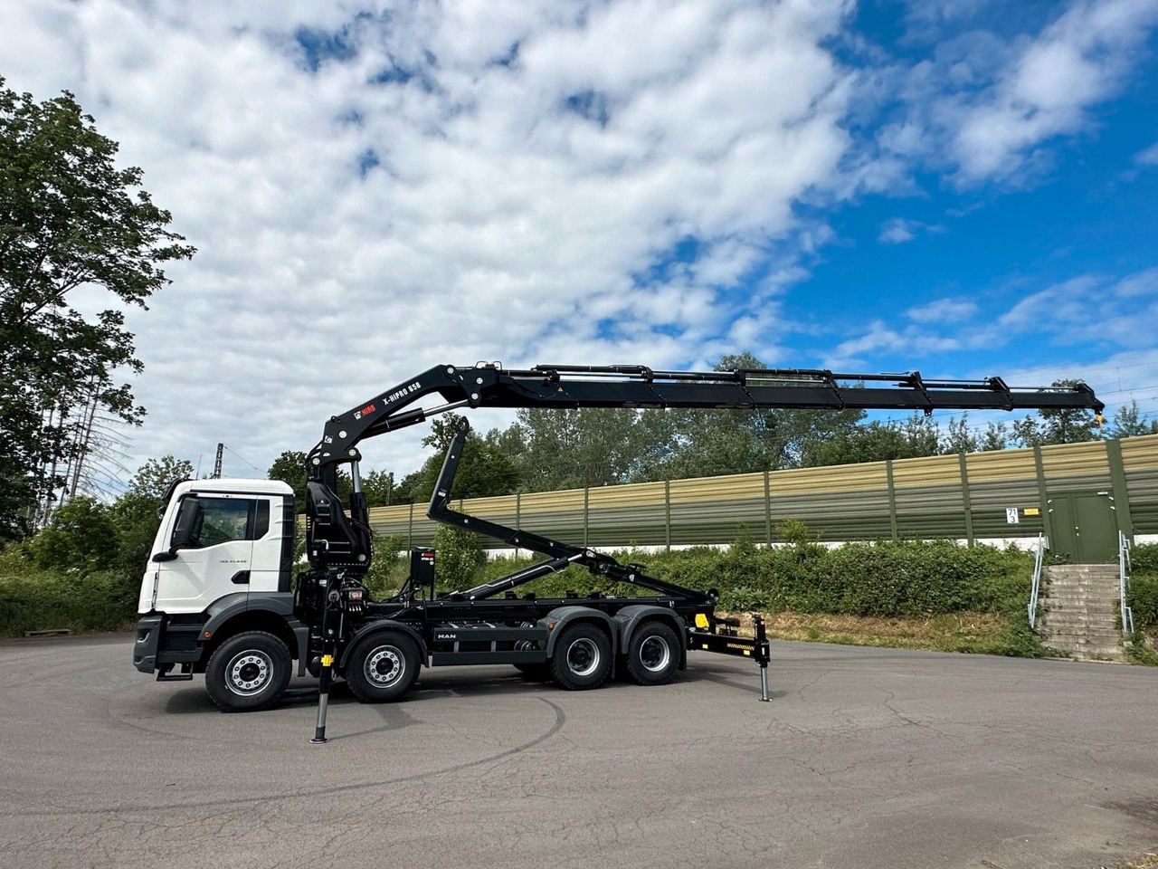 Abrollkipper, Autokran MAN TGS 35.520 8x4  Abrollkipper + Kran HIAB 658E6: das Bild 13