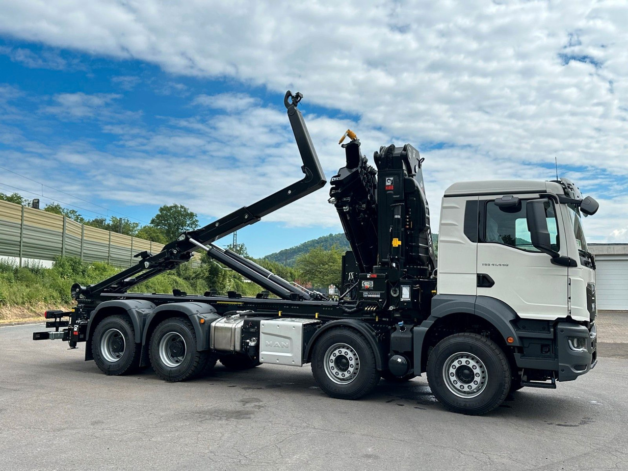 Abrollkipper, Autokran MAN TGS 35.520 8x4  Abrollkipper + Kran HIAB 658E6: das Bild 10