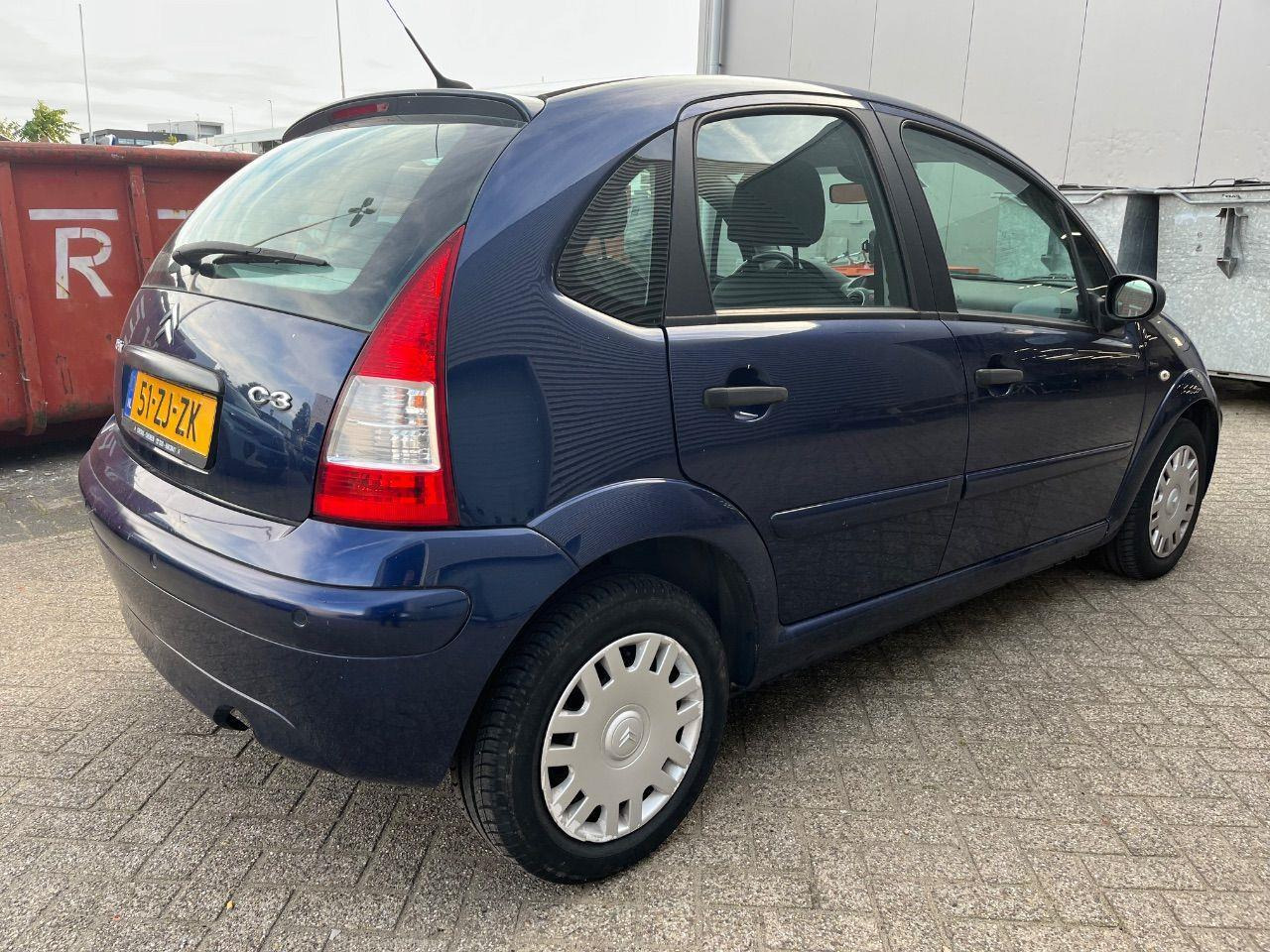 Citroen C3 1.4i Ambiance | 2008 | 82.298 km | 51ZJZK | NAP: Logisch - Schrägheck: das Bild 4 Citroen C3 1.4i Ambiance | 2008 | 82.298 km | 51ZJZK | NAP: Logisch - Schrägheck: das Bild 4