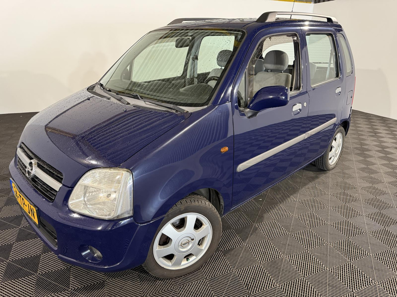 Opel | Agila | 1.2-16V Flexx | 2006 | 214.096 km | 34TPJN | Logisch - Schrägheck: das Bild 1 Opel | Agila | 1.2-16V Flexx | 2006 | 214.096 km | 34TPJN | Logisch - Schrägheck: das Bild 1