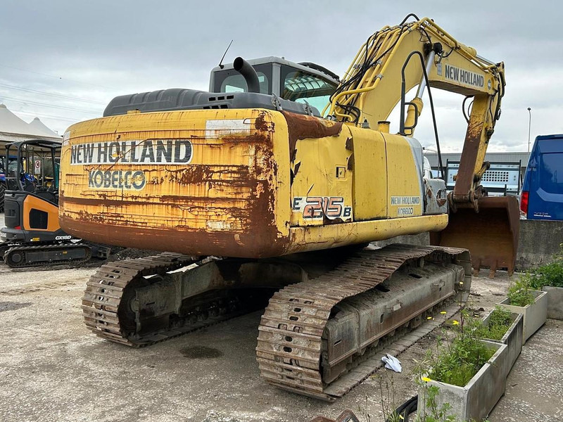 New Holland E215B - Bagger: das Bild 5 New Holland E215B - Bagger: das Bild 5