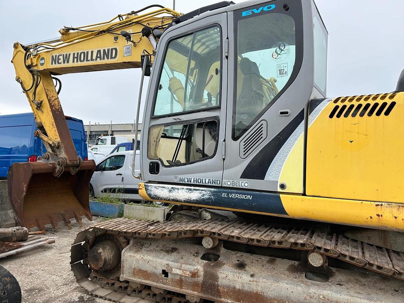 New Holland E215B - Bagger: das Bild 4 New Holland E215B - Bagger: das Bild 4