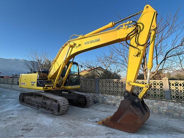 New Holland E245B - Bagger: das Bild 1 New Holland E245B - Bagger: das Bild 1