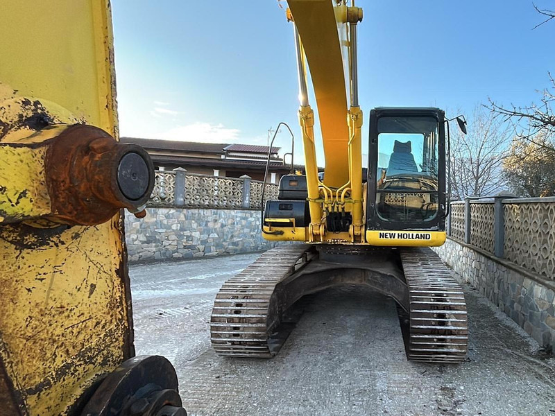 New Holland E245B - Bagger: das Bild 3 New Holland E245B - Bagger: das Bild 3