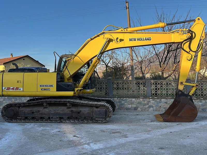 New Holland E245B - Bagger: das Bild 2 New Holland E245B - Bagger: das Bild 2