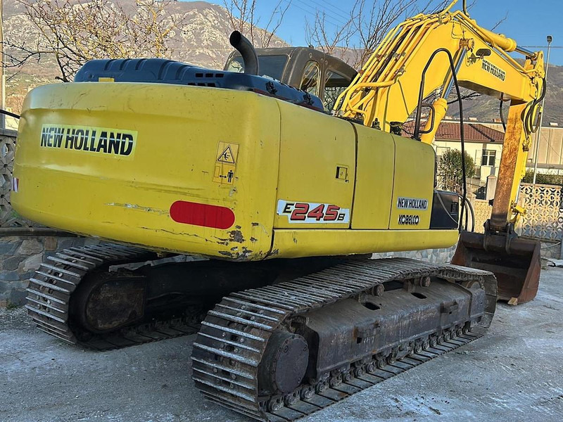 New Holland E245B - Bagger: das Bild 4 New Holland E245B - Bagger: das Bild 4