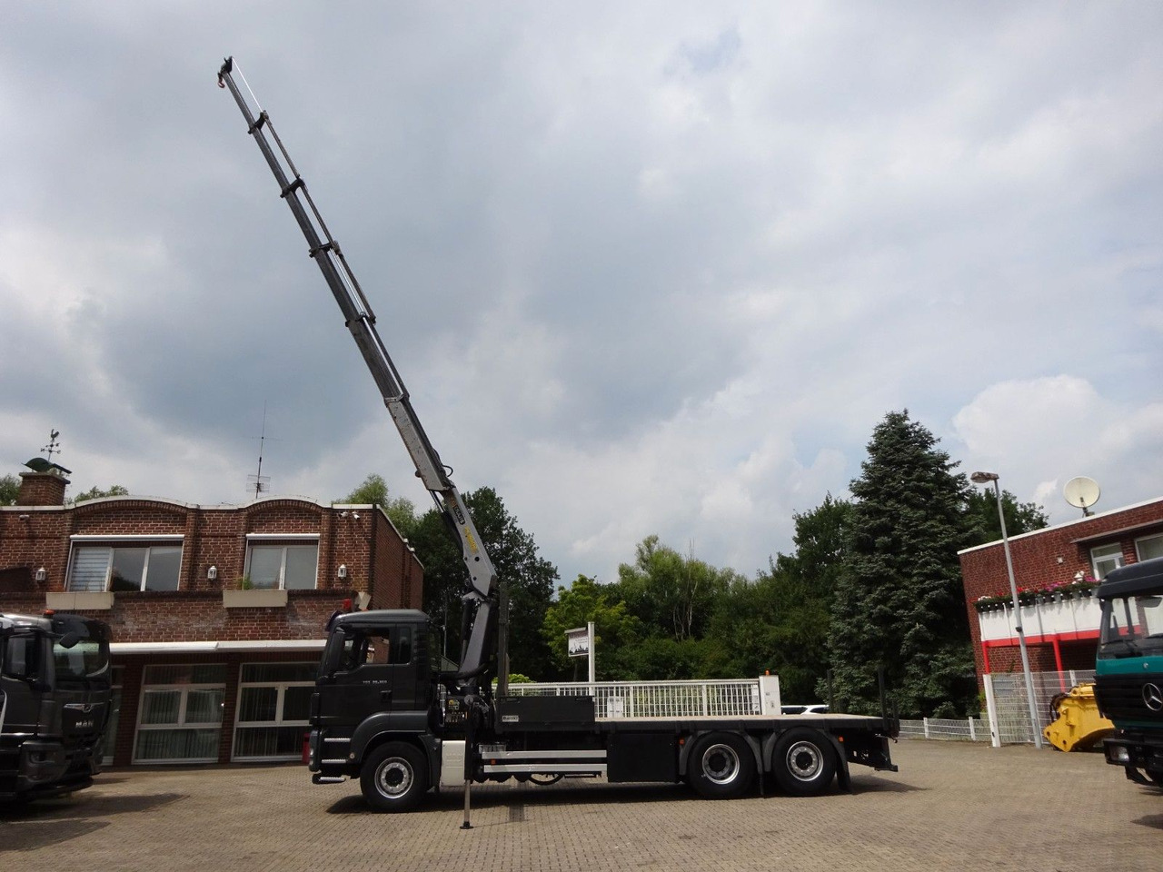 MAN 26.360 TGS Pritsche + PK 16502 Kran 6x2 - Autokran: das Bild 2 MAN 26.360 TGS Pritsche + PK 16502 Kran 6x2 - Autokran: das Bild 2