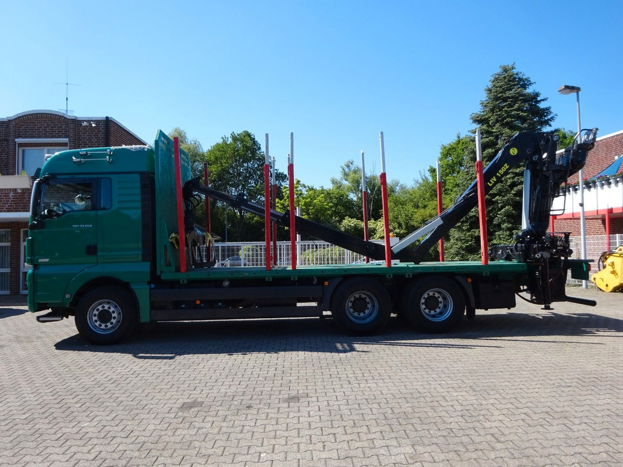 MAN 33.560 TGX mit TAJFUN L150Z Holzladekran 6x4 - Holztransporter, Autokran: das Bild 3 MAN 33.560 TGX mit TAJFUN L150Z Holzladekran 6x4 - Holztransporter, Autokran: das Bild 3