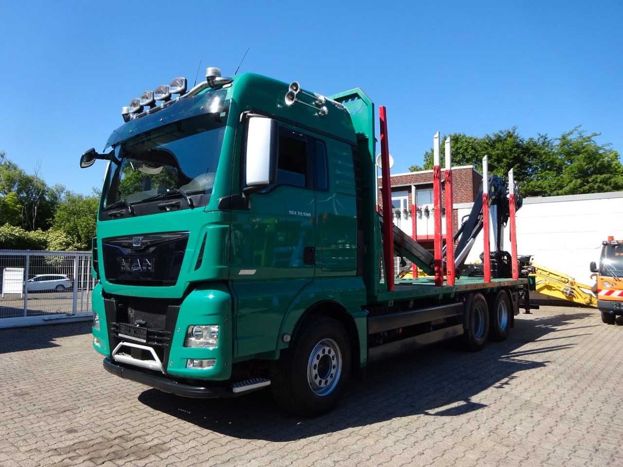 MAN 33.560 TGX mit TAJFUN L150Z Holzladekran 6x4 - Holztransporter, Autokran: das Bild 2 MAN 33.560 TGX mit TAJFUN L150Z Holzladekran 6x4 - Holztransporter, Autokran: das Bild 2