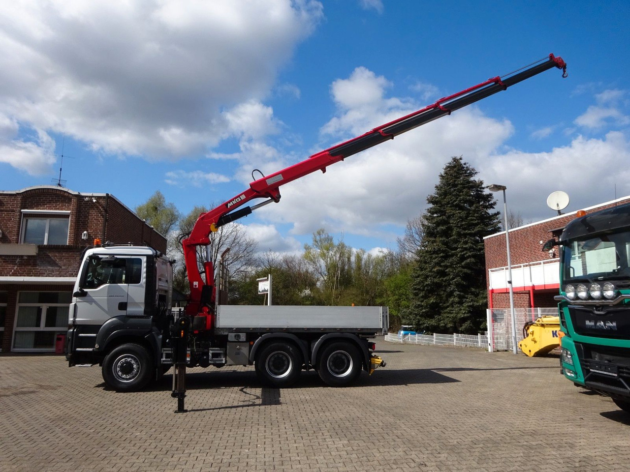 MAN 33.500 TGS + MKG HLK 231 Kran 6x6 Hydrodrive - Sattelzugmaschine: das Bild 3 MAN 33.500 TGS + MKG HLK 231 Kran 6x6 Hydrodrive - Sattelzugmaschine: das Bild 3