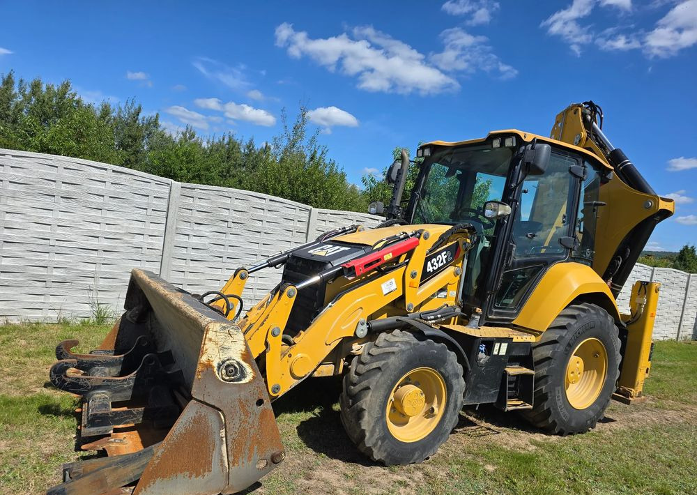 Caterpillar - Baggerlader: das Bild 1 Caterpillar - Baggerlader: das Bild 1