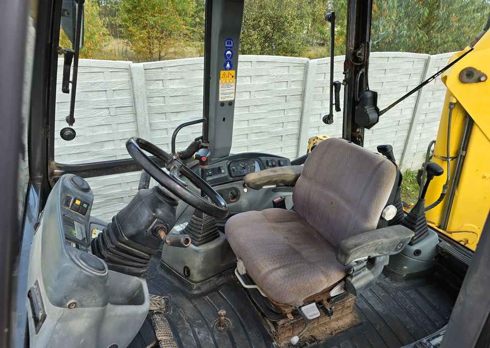 New Holland - Baggerlader: das Bild 3 New Holland - Baggerlader: das Bild 3