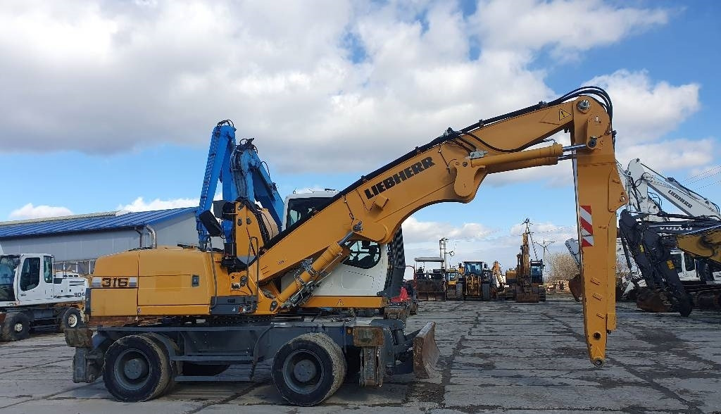 Liebherr A 316 Litronic - Umschlagbagger: das Bild 5 Liebherr A 316 Litronic - Umschlagbagger: das Bild 5