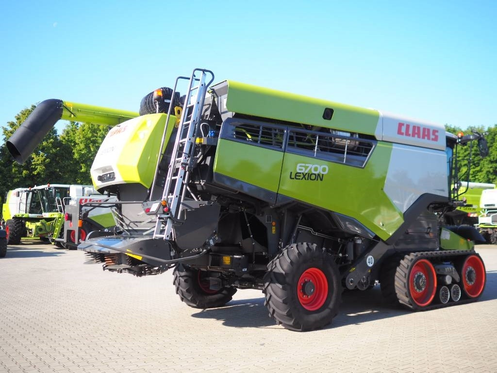 Claas Lexion 6700TT GPS + V770 - Mähdrescher: das Bild 3 Claas Lexion 6700TT GPS + V770 - Mähdrescher: das Bild 3