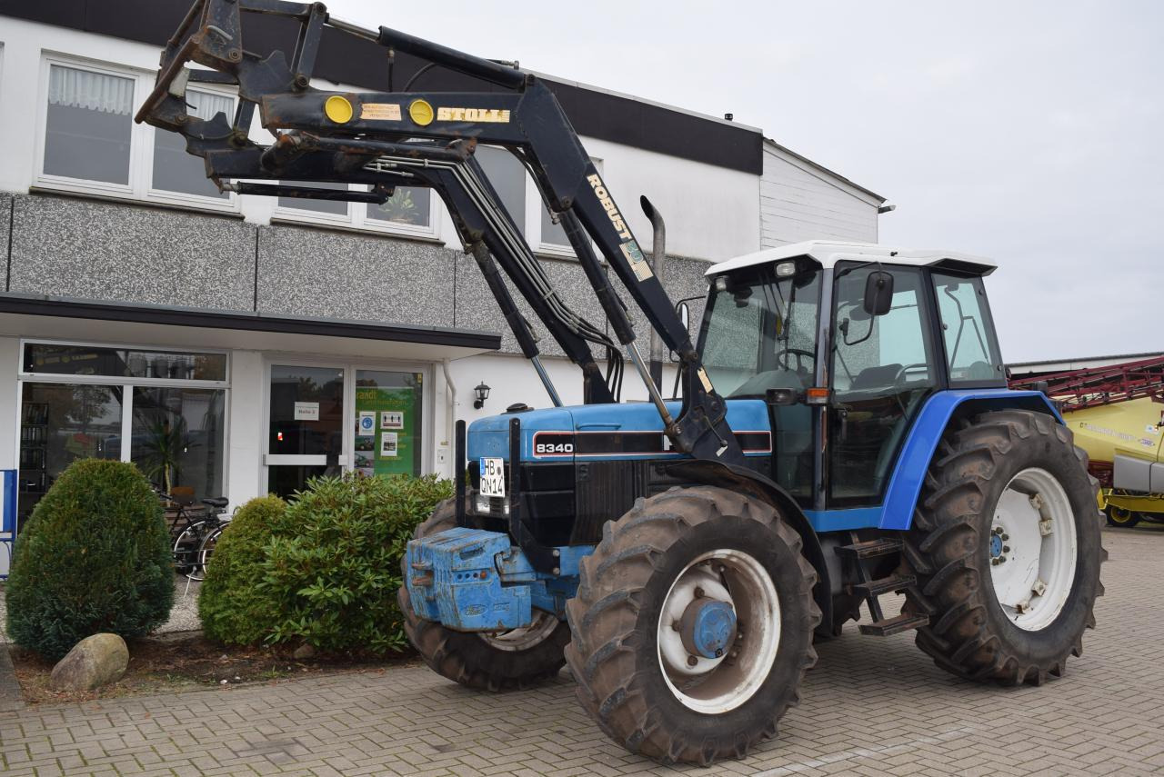 New Holland 8340 - Traktor: das Bild 1 New Holland 8340 - Traktor: das Bild 1