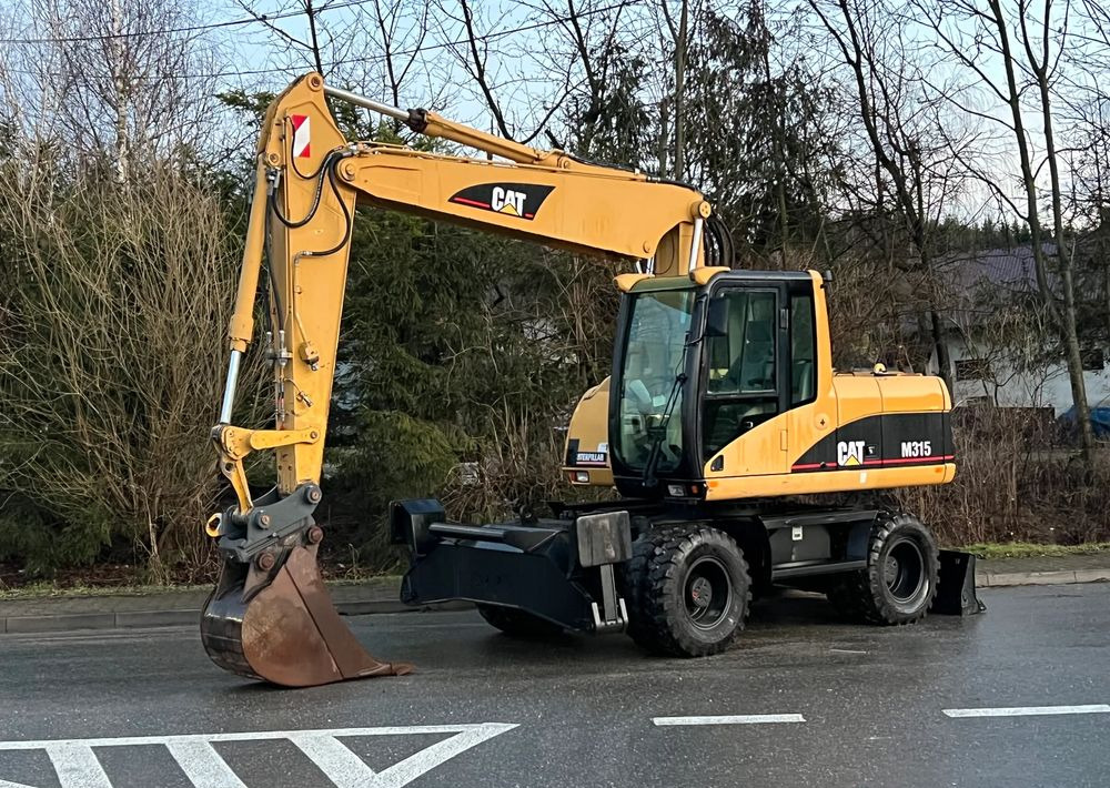 Caterpillar CAT M315C CATERPILLAR SPROWADZONY Bardzo Dobry Stan - Mobilbagger: das Bild 1 Caterpillar CAT M315C CATERPILLAR SPROWADZONY Bardzo Dobry Stan - Mobilbagger: das Bild 1