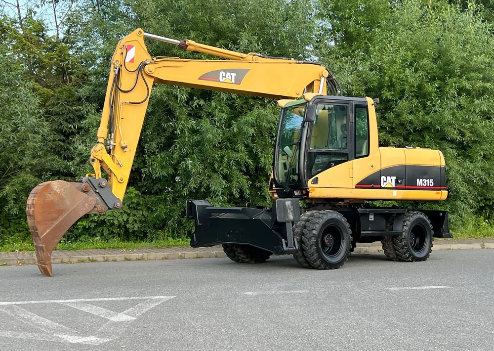 Caterpillar CAT M315C CATERPILLAR SPROWADZONY Bardzo Dobry Stan - Mobilbagger: das Bild 1 Caterpillar CAT M315C CATERPILLAR SPROWADZONY Bardzo Dobry Stan - Mobilbagger: das Bild 1