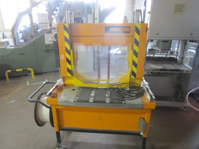 BANDEROLIERMASCHINE STRAPEX SMG 50 - Verpackungsmaschine: das Bild 2 BANDEROLIERMASCHINE STRAPEX SMG 50 - Verpackungsmaschine: das Bild 2