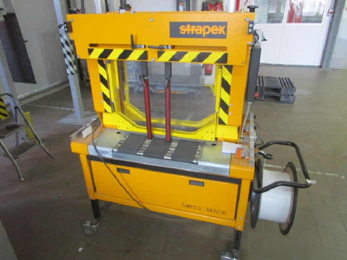 BANDEROLIERMASCHINE STRAPEX SMG 50 - Verpackungsmaschine: das Bild 1 BANDEROLIERMASCHINE STRAPEX SMG 50 - Verpackungsmaschine: das Bild 1