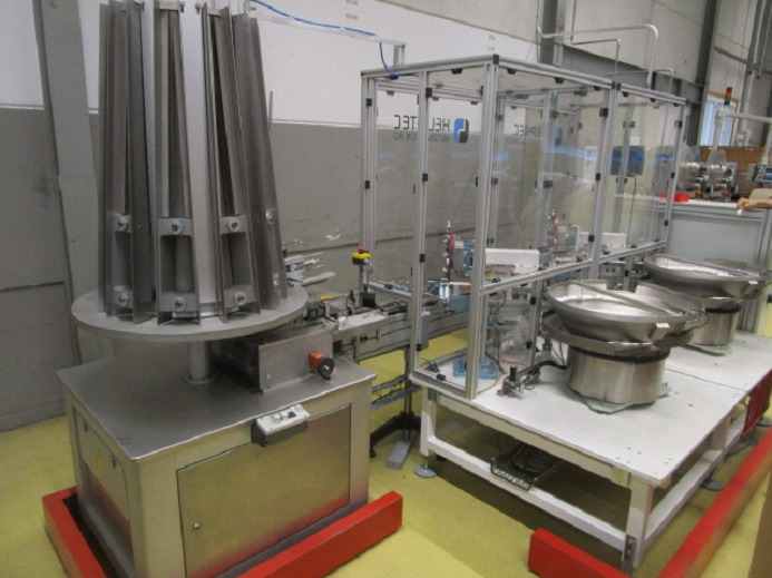 DECKEL ETIKETTIER ANLAGE SCHLEUTER GU 2 DO MIT 2xLÖFFELEINLEGESTATIONEN - Industriemaschine: das Bild 1 DECKEL ETIKETTIER ANLAGE SCHLEUTER GU 2 DO MIT 2xLÖFFELEINLEGESTATIONEN - Industriemaschine: das Bild 1