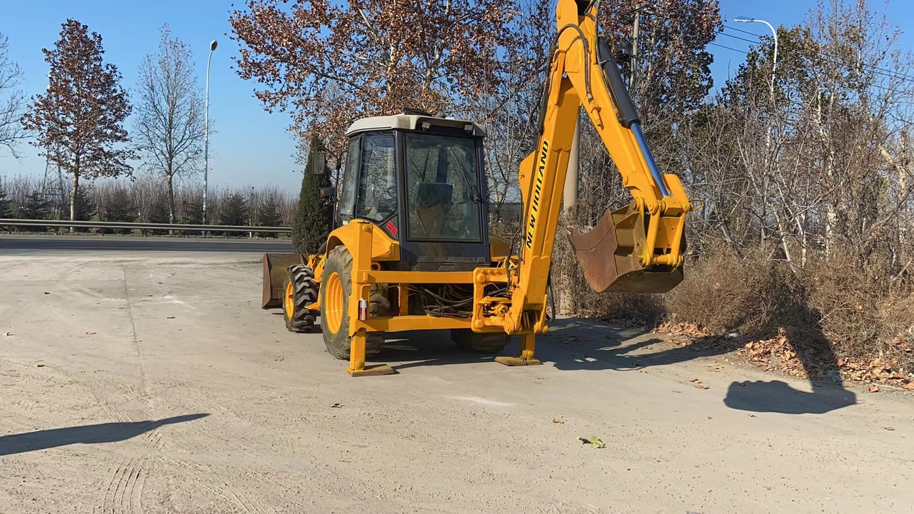 NEW HOLLAND LB95 - Baggerlader: das Bild 4 NEW HOLLAND LB95 - Baggerlader: das Bild 4