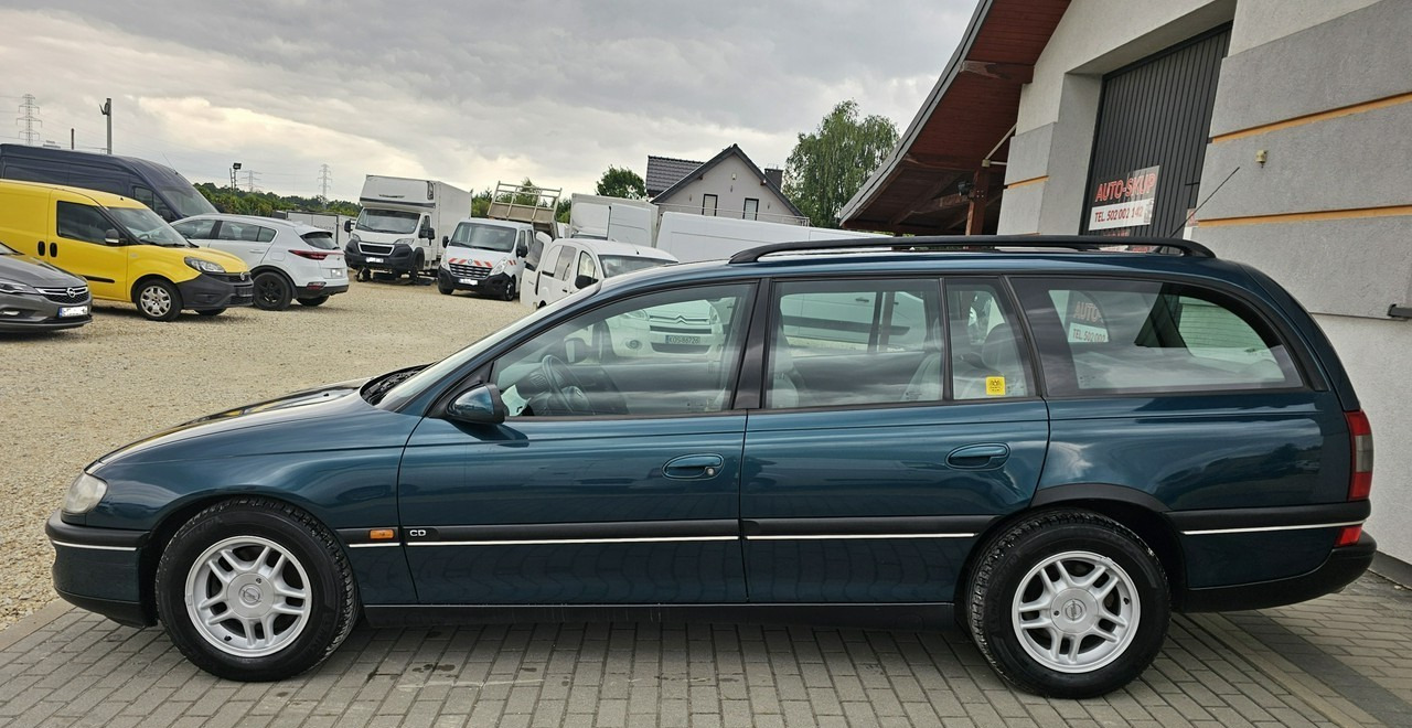 Opel Omega B 2,5 v6 *automat* napęd tył *welury* - Kombi: das Bild 4 Opel Omega B 2,5 v6 *automat* napęd tył *welury* - Kombi: das Bild 4