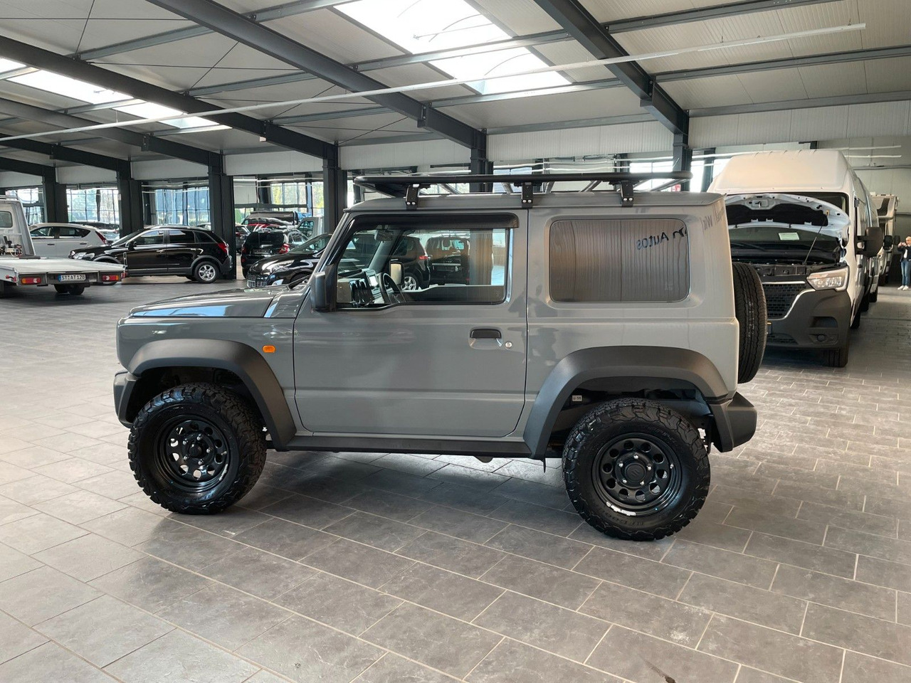 Suzuki Jimny Comfort AllGrip NFZ Dachgepäckträger - SUV/ Geländewagen: das Bild 5 Suzuki Jimny Comfort AllGrip NFZ Dachgepäckträger - SUV/ Geländewagen: das Bild 5