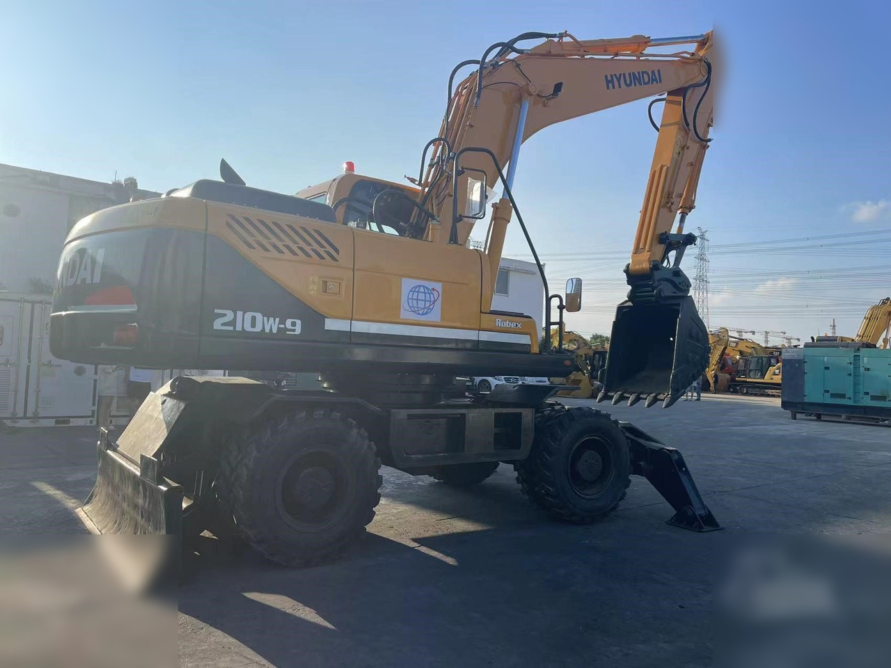 HYUNDAI ROBEX 210W-9 - Mobilbagger: das Bild 2 HYUNDAI ROBEX 210W-9 - Mobilbagger: das Bild 2