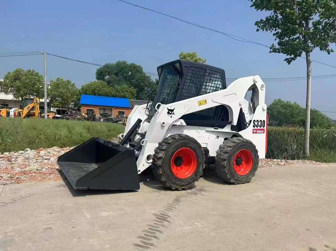 BOBCAT S330 - Kompaktlader: das Bild 1 BOBCAT S330 - Kompaktlader: das Bild 1