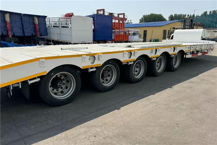 TITAN 5 Axle 100 Ton Low Bed Trailer for Sale In Tanzania - Tieflader Auflieger: das Bild 3 TITAN 5 Axle 100 Ton Low Bed Trailer for Sale In Tanzania - Tieflader Auflieger: das Bild 3