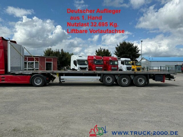 Schmitz Cargobull SCS24 Plattform Liftachse 33t. Nutzlast TÜV09-26 - Pritschenauflieger/ Plattformauflieger: das Bild 1 Schmitz Cargobull SCS24 Plattform Liftachse 33t. Nutzlast TÜV09-26 - Pritschenauflieger/ Plattformauflieger: das Bild 1