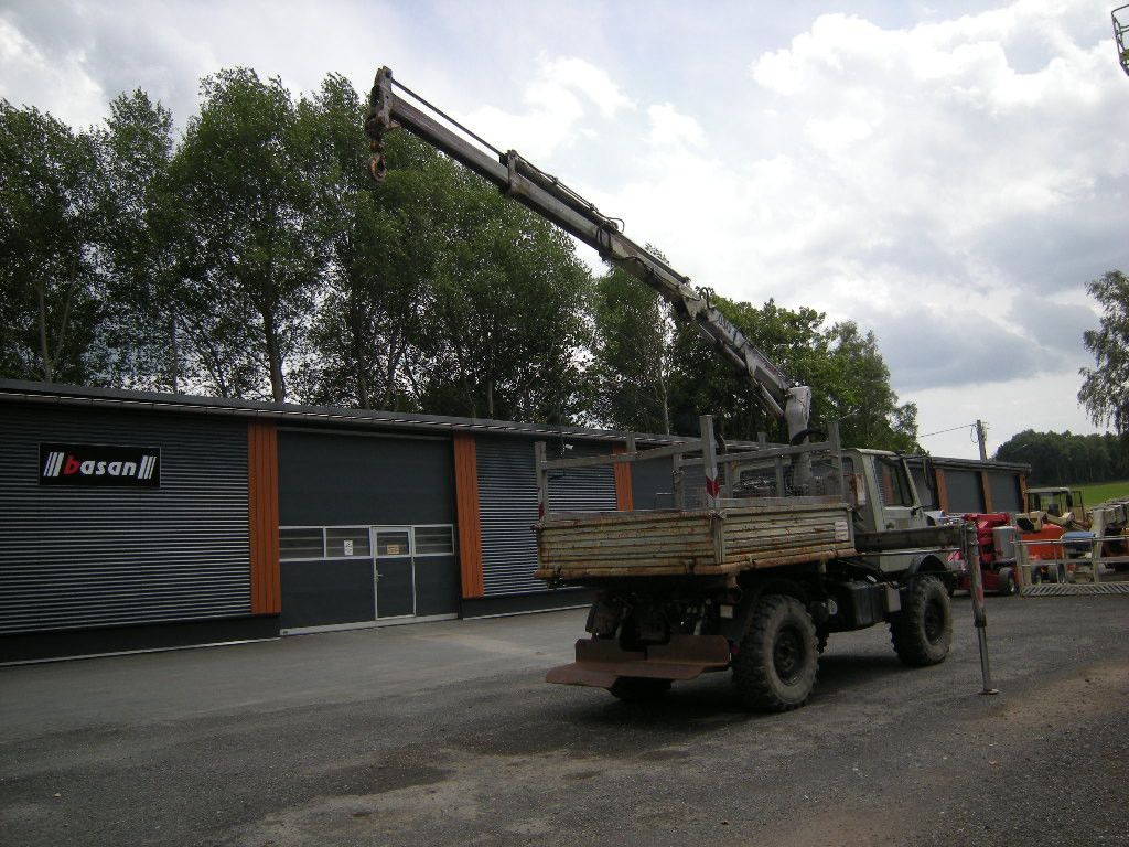 Mercedes-Benz Unimog U1250 mit Kran MKG 105 - Kipper Transporter: das Bild 2 Mercedes-Benz Unimog U1250 mit Kran MKG 105 - Kipper Transporter: das Bild 2