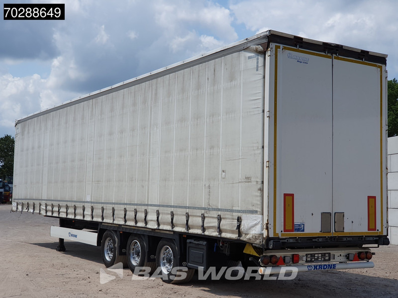 Krone SD 3 axles MEGA Schiebedach Hubdach 100m3 - Planenauflieger: das Bild 2 Krone SD 3 axles MEGA Schiebedach Hubdach 100m3 - Planenauflieger: das Bild 2