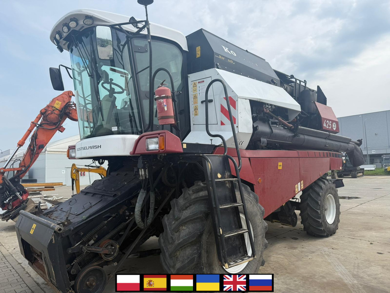 ROSTSELMASH VECTOR 425 RSM-101 grain harvester + Header 5 m + rapeseed harvesting extension / 2300 MTH - Mähdrescher: das Bild 1 ROSTSELMASH VECTOR 425 RSM-101 grain harvester + Header 5 m + rapeseed harvesting extension / 2300 MTH - Mähdrescher: das Bild 1