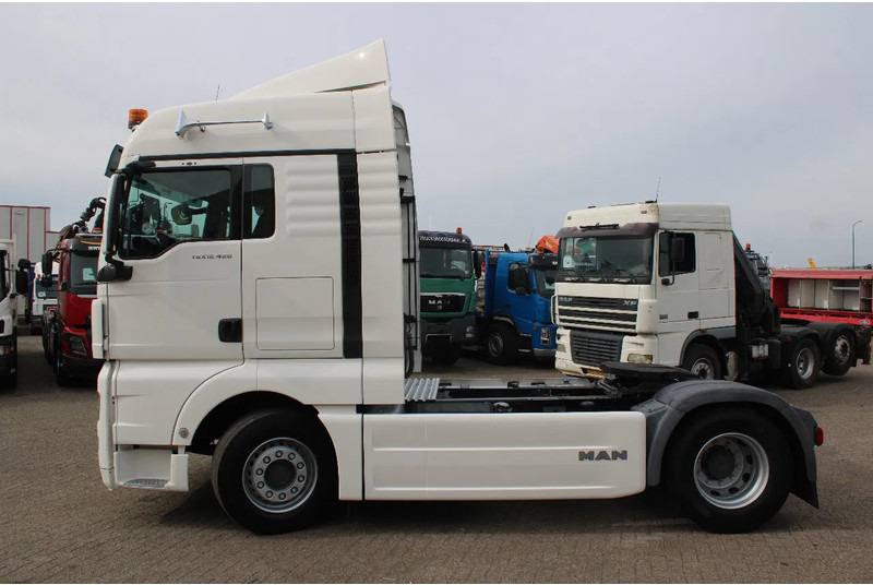 MAN TGX 480 + EURO 5 + RETARDER + FULL SPOILER - Sattelzugmaschine: das Bild 5 MAN TGX 480 + EURO 5 + RETARDER + FULL SPOILER - Sattelzugmaschine: das Bild 5