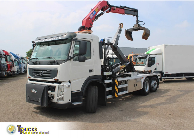 Volvo FM 330 + HMF 1035 + HOOKSYTEM HYVA + EURO 5 + 6X2 - Seil Abrollkipper, Autokran: das Bild 1 Volvo FM 330 + HMF 1035 + HOOKSYTEM HYVA + EURO 5 + 6X2 - Seil Abrollkipper, Autokran: das Bild 1