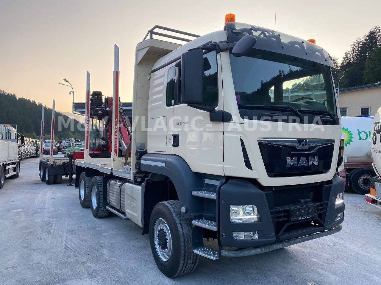 MAN 33.500 6X6 mit Kran PENZ 12Z - Holztransporter, Autokran: das Bild 2 MAN 33.500 6X6 mit Kran PENZ 12Z - Holztransporter, Autokran: das Bild 2