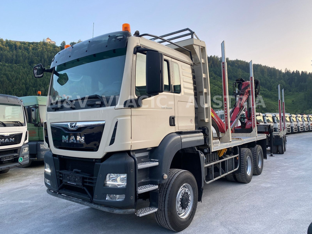 MAN 33.500 6X6 mit Kran PENZ 12Z - Holztransporter, Autokran: das Bild 1 MAN 33.500 6X6 mit Kran PENZ 12Z - Holztransporter, Autokran: das Bild 1