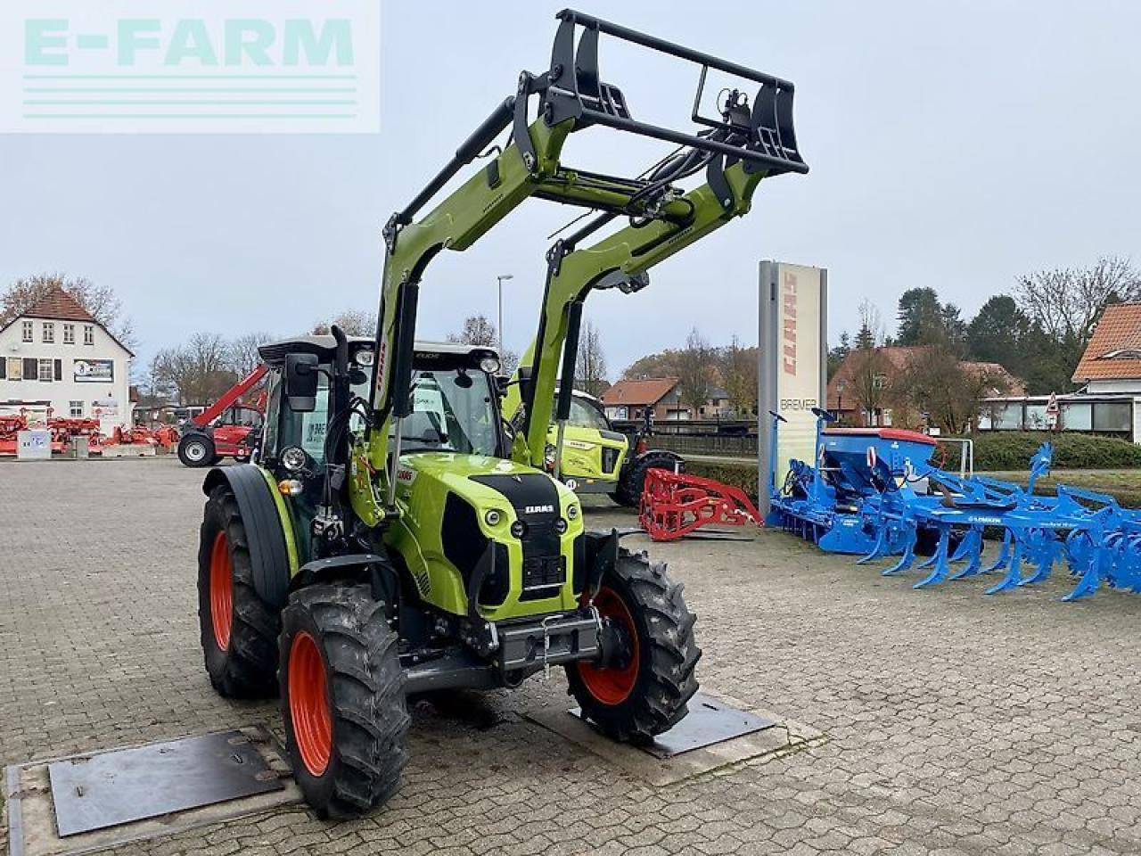 CLAAS elios 210, frontlader, frontscheibe ausstellbar - Traktor: das Bild 2 CLAAS elios 210, frontlader, frontscheibe ausstellbar - Traktor: das Bild 2