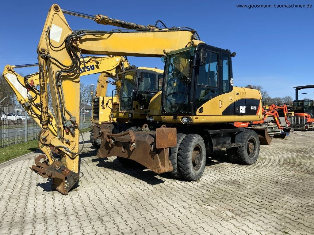 CAT M 315D - Mobilbagger: das Bild 1 CAT M 315D - Mobilbagger: das Bild 1