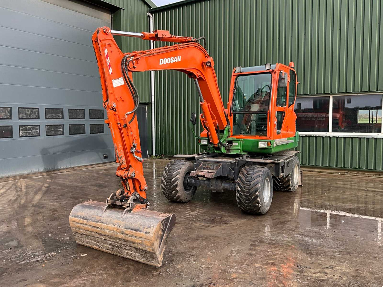 2014 DOOSAN DX55W WHEELED EXCAVATOR - Mobilbagger: das Bild 1 2014 DOOSAN DX55W WHEELED EXCAVATOR - Mobilbagger: das Bild 1