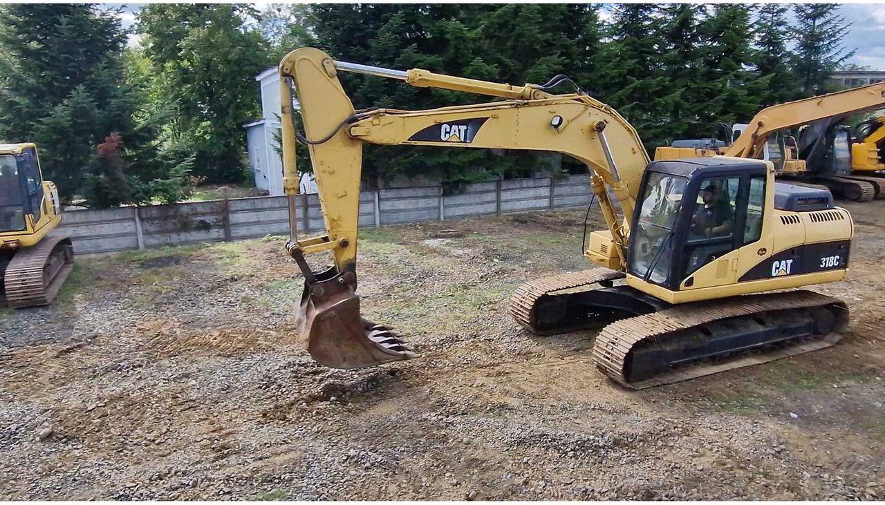 Caterpillar 318C - Kettenbagger: das Bild 3 Caterpillar 318C - Kettenbagger: das Bild 3