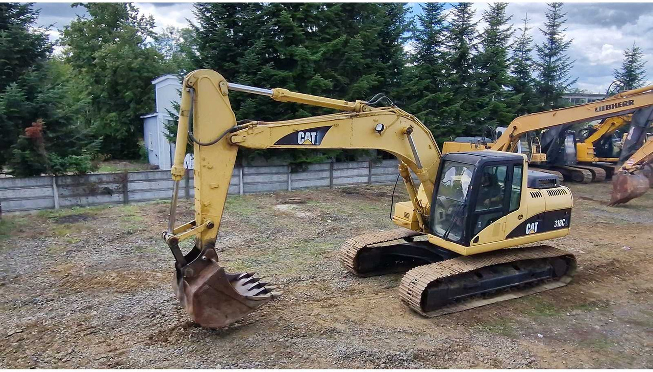 Caterpillar 318C - Kettenbagger: das Bild 5 Caterpillar 318C - Kettenbagger: das Bild 5