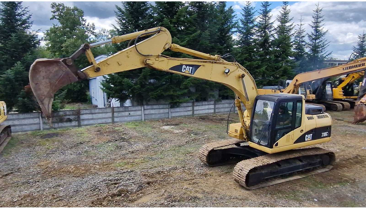Caterpillar 318C - Kettenbagger: das Bild 2 Caterpillar 318C - Kettenbagger: das Bild 2