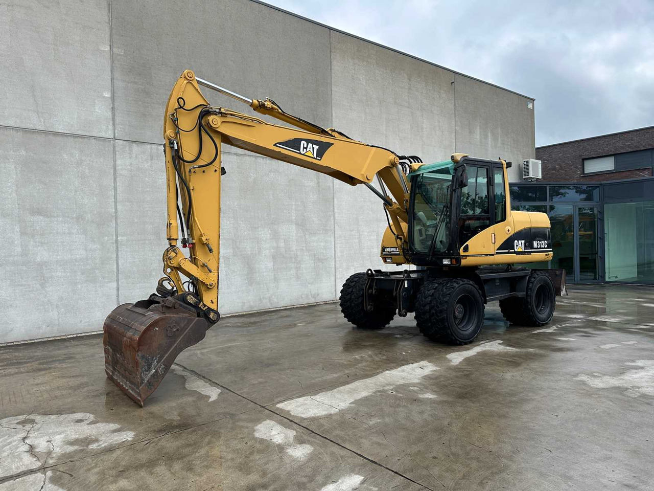 Caterpillar M313C - Mobilbagger: das Bild 1 Caterpillar M313C - Mobilbagger: das Bild 1